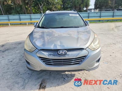 Piąte zdjęcie samochodu w środku: 2012 HYUNDAI TUCSON GLS VIN:KM8JU3AC2CU485494 - miniatura