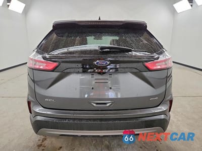 Zdjęcie 6 z 14 samochodu: 2022 FORD EDGE SEL VIN:2FMPK4J92NBA41020 - miniatura