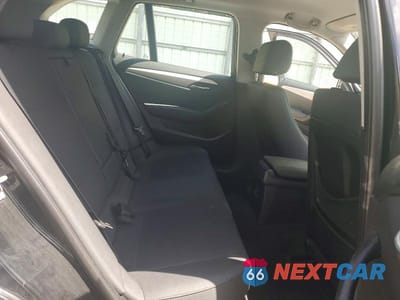 Zdjęcie 11 z 13 samochodu: 2014 BMW X1 SDRIVE28I VIN:WBAVM1C51EVW47215 - miniatura