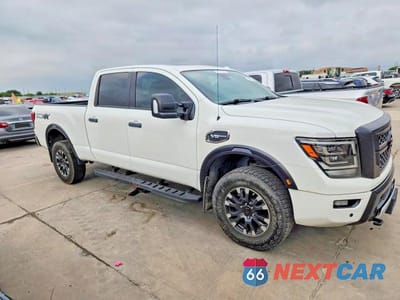 Czwarte zdjęcie samochodu z boku: 2021 NISSAN TITAN XD PRO-4X VIN:1N6AA1FB9MN513107 - miniatura