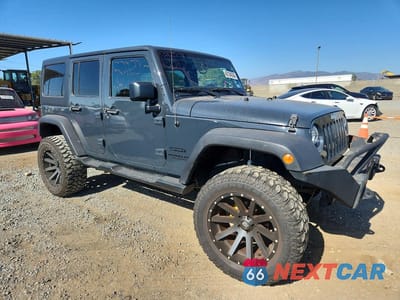 Czwarte zdjęcie samochodu z boku: 2016 JEEP WRANGLER UNLIMITED SPORT VIN:1C4BJWDG8GL318909 - miniatura