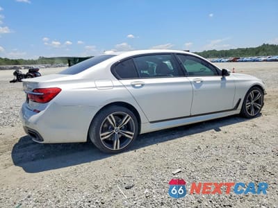 Trzecie zdjęcie samochodu z tyłu: 2018 BMW 740 I VIN:WBA7E2C54JG742183 - miniatura