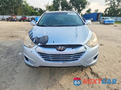 Piąte zdjęcie samochodu w środku: 2011 HYUNDAI TUCSON GLS VIN:KM8JU3AC3BU244624 - miniatura