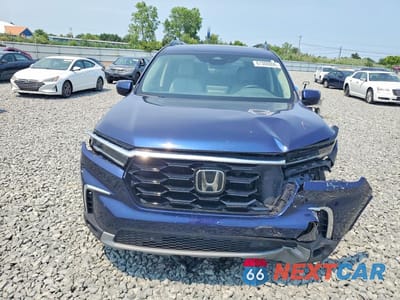 Piąte zdjęcie samochodu w środku: 2023 HONDA PILOT TOURING VIN:5FNYG1H71PB038385 - miniatura