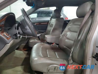 Zdjęcie 7 z 12 samochodu: 2000 CADILLAC DEVILLE VIN:1G6KD54YXYU260245 - miniatura