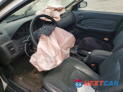 Zdjęcie 8 z 12 samochodu: 1995 NISSAN MAXIMA GXE VIN:JN1CA21D2ST031018 - miniatura