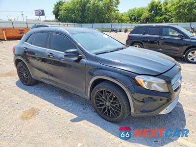 Czwarte zdjęcie samochodu z boku: 2015 MERCEDES-BENZ GLA 250 VIN:WDCTG4EB2FJ128473 - miniatura