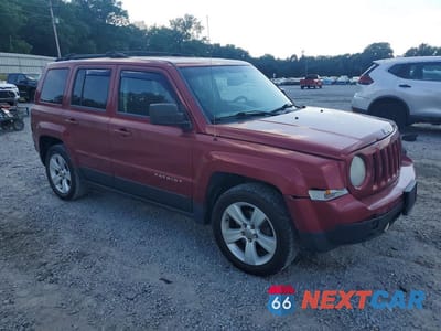 Czwarte zdjęcie samochodu z boku: 2014 JEEP PATRIOT LATITUDE VIN:1C4NJPFB3ED510265 - miniatura