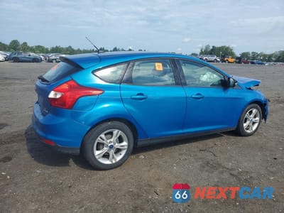 Trzecie zdjęcie samochodu z tyłu: 2013 FORD FOCUS SE VIN:1FADP3K23DL371967 - miniatura