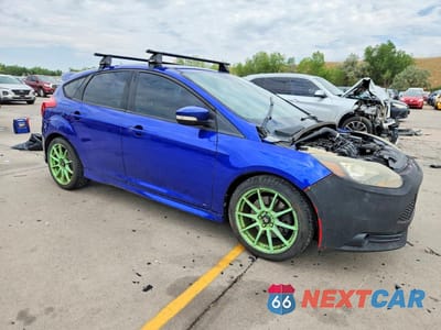 Czwarte zdjęcie samochodu z boku: 2014 FORD FOCUS ST VIN:1FADP3L98EL147641 - miniatura