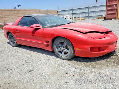 Czwarte zdjęcie samochodu z boku: 1999 PONTIAC FIREBIRD VIN:2G2FS22K8X2218120 - miniatura