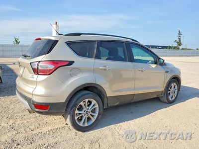Trzecie zdjęcie samochodu z tyłu: 2017 FORD ESCAPE SE VIN:1FMCU9GD8HUE34066 - miniatura