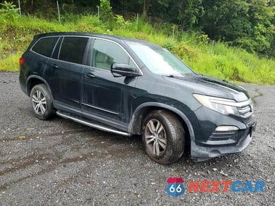 Czwarte zdjęcie samochodu z boku: 2017 HONDA PILOT EX VIN:5FNYF6H38HB009903 - miniatura