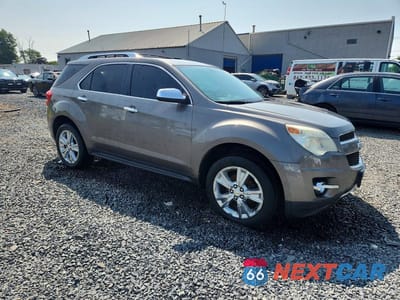 Czwarte zdjęcie samochodu z boku: 2011 CHEVROLET EQUINOX LTZ VIN:2CNFLGE56B6274291 - miniatura