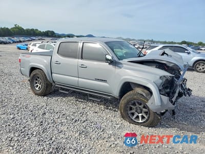 Czwarte zdjęcie samochodu z boku: 2021 TOYOTA TACOMA TRD SPORT VIN:3TYCZ5AN8MT026315 - miniatura