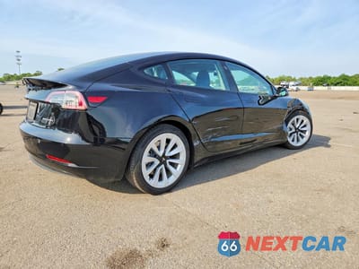 Trzecie zdjęcie samochodu z tyłu: 2022 TESLA MODEL 3 VIN:5YJ3E1EB2NF203480 - miniatura