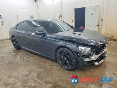 Czwarte zdjęcie samochodu z boku: 2019 BMW 740 I VIN:WBA7E2C53KB217310 - miniatura