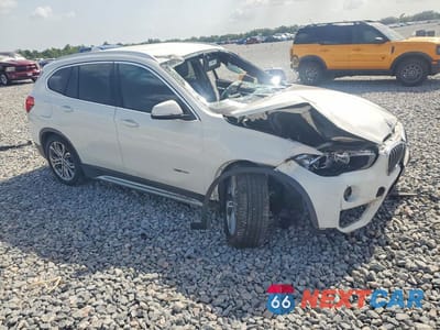 Czwarte zdjęcie samochodu z boku: 2017 BMW X1 XDRIVE28I VIN:WBXHT3C36H5F73989 - miniatura