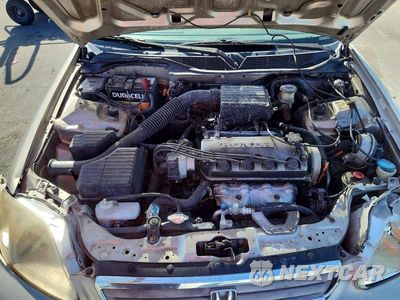 Zdjęcie 21 z 24 samochodu: 2000 HONDA CIVIC LX VIN:1HGEJ6672YL052476 - miniatura