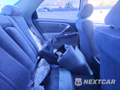 Zdjęcie 10 z 12 samochodu: 1999 TOYOTA CAMRY LE VIN:JT2BG22K2X0278819 - miniatura