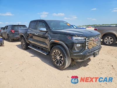 Czwarte zdjęcie samochodu z boku: 2025 GMC CANYON DENALI VIN:1GTP2FEK2S1200266 - miniatura