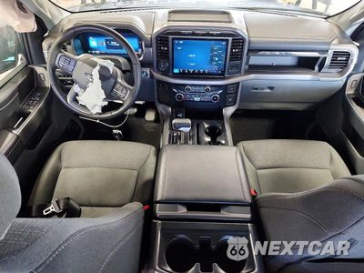 Zdjęcie 8 z 13 samochodu: 2024 FORD F150 LIGHTNING XLT VIN:1FTVW3LK4RWG06236 - miniatura