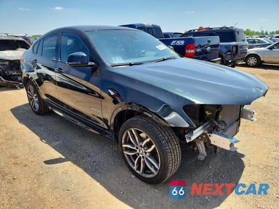 Czwarte zdjęcie samochodu z boku: 2015 BMW X4 XDRIVE28I VIN:5UXXW3C58F0M88143 - miniatura