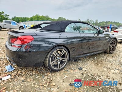 Trzecie zdjęcie samochodu z tyłu: 2015 BMW M6 VIN:WBSLZ9C53FD651227 - miniatura