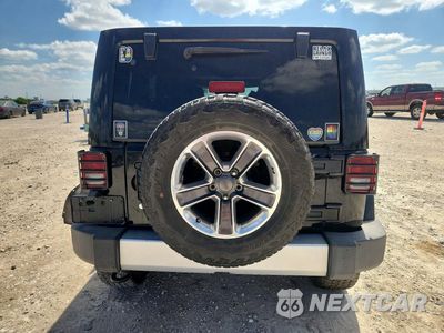 Zdjęcie 6 z 12 samochodu: 2015 JEEP WRANGLER UNLIMITED SAHARA VIN:1C4HJWEG5FL620407 - miniatura