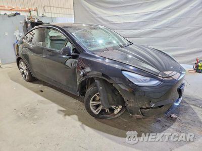 Czwarte zdjęcie samochodu z boku: 2021 TESLA MODEL Y VIN:5YJYGAEEXMF250359 - miniatura