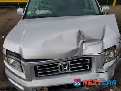 Zdjęcie 11 z 12 samochodu: 2006 HONDA RIDGELINE RTL VIN:2HJYK16526H547440 - miniatura