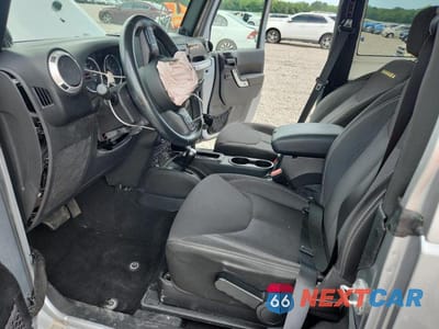 Zdjęcie 7 z 13 samochodu: 2014 JEEP WRANGLER SAHARA VIN:1C4AJWBG6EL258558 - miniatura