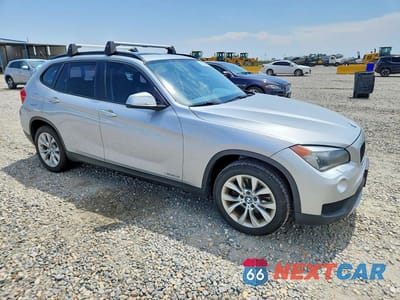Czwarte zdjęcie samochodu z boku: 2013 BMW X1 XDRIVE28I VIN:WBAVL1C56DVR92001 - miniatura
