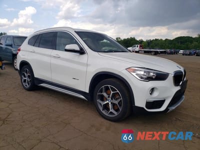 Czwarte zdjęcie samochodu z boku: 2017 BMW X1 XDRIVE28I VIN:WBXHT3C37H5F67702 - miniatura