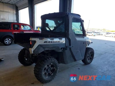Czwarte zdjęcie samochodu z boku: 2021 POLARIS RANGER 1000 XP UTILITY VEHICLE VIN:4XARRY998M8071765 - miniatura