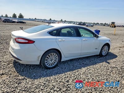 Trzecie zdjęcie samochodu z tyłu: 2014 FORD FUSION SE PHEV VIN:3FA6P0PU8ER248072 - miniatura