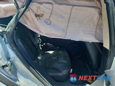 Zdjęcie 10 z 12 samochodu: 2013 TESLA MODEL S VIN:5YJSA1DP8DFP17062 - miniatura