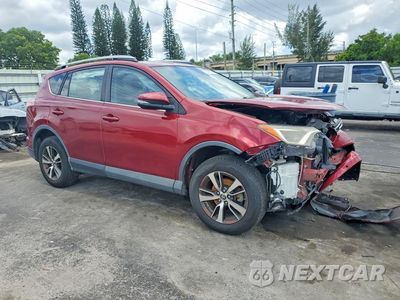 Czwarte zdjęcie samochodu z boku: 2018 TOYOTA RAV4 XLE VIN:2T3WFREV7JW474493 - miniatura