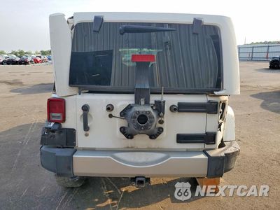 Zdjęcie 6 z 13 samochodu: 2014 JEEP WRANGLER UNLIMITED SAHARA VIN:1C4BJWEG8EL107172 - miniatura