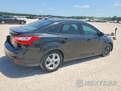 Trzecie zdjęcie samochodu z tyłu: 2014 FORD FOCUS SE VIN:1FADP3F27EL287825 - miniatura
