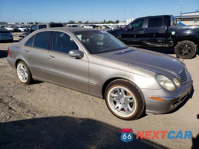 Czwarte zdjęcie samochodu z boku: 2005 MERCEDES-BENZ E 320 VIN:WDBUF65J55A669496 - miniatura