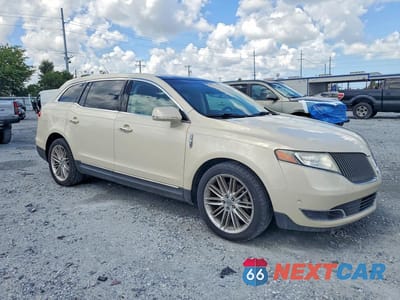 Czwarte zdjęcie samochodu z boku: 2014 LINCOLN MKT VIN:2LMHJ5ATXEBL53518 - miniatura