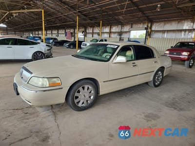 2003 LINCOLN TOWN CAR CARTIER 1LNHM83W23Y651217 - główne zdjęcie licytacji z USA - miniatura
