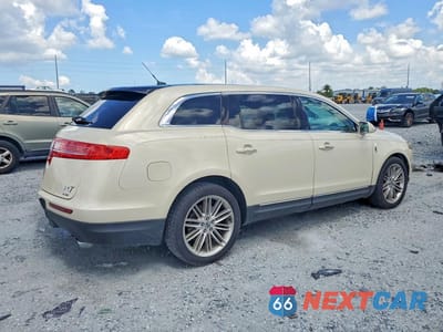 Trzecie zdjęcie samochodu z tyłu: 2014 LINCOLN MKT VIN:2LMHJ5ATXEBL53518 - miniatura