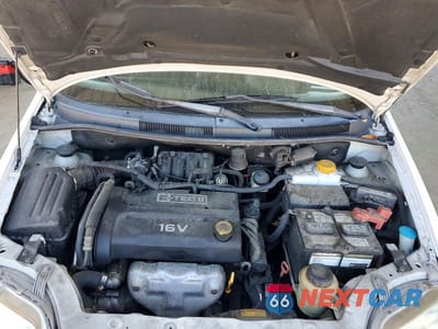 Zdjęcie 11 z 12 samochodu: 2006 CHEVROLET AVEO BASE VIN:KL1TD66686B674529 - miniatura
