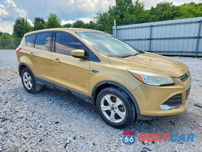 Czwarte zdjęcie samochodu z boku: 2014 FORD ESCAPE SE VIN:1FMCU0G90EUE08550 - miniatura
