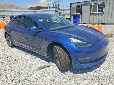 Czwarte zdjęcie samochodu z boku: 2023 TESLA MODEL 3 VIN:5YJ3E1EA5PF447019 - miniatura