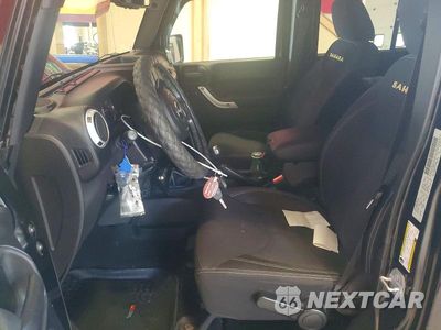 Zdjęcie 7 z 13 samochodu: 2015 JEEP WRANGLER UNLIMITED SAHARA VIN:1C4BJWEG6FL690620 - miniatura