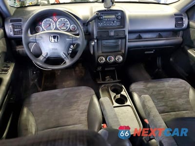 Zdjęcie 8 z 13 samochodu: 2004 HONDA CR-V LX VIN:JHLRD68424C008145 - miniatura