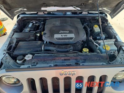 Zdjęcie 12 z 14 samochodu: 2015 JEEP WRANGLER UNLIMITED SAHARA VIN:1C4BJWEG0FL563913 - miniatura